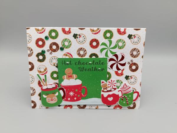 Weihnachtskarte Hot Chocolate Weather mit Becher- und Donut-Motiven